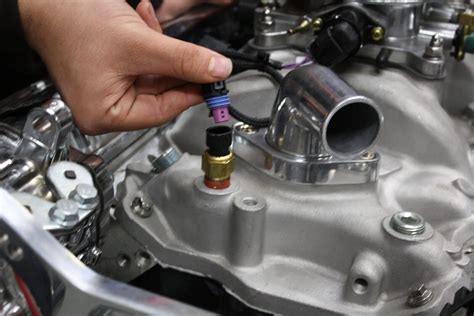 In the image above, you can see that most coolant temperature sensors are located on the top, driver side of the engine. . 2009 chevy silverado coolant temperature sensor location